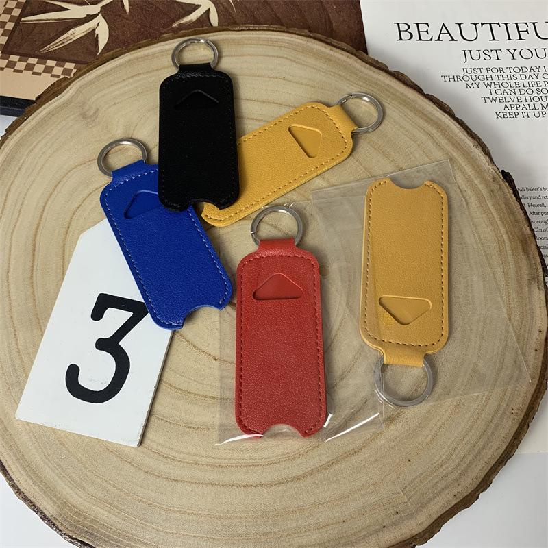 ซองใส่ลิปบาล์มแบบพกพาพร้อมพวงก - Key Holder Leather Pouch บทวิจารณ์และราคา